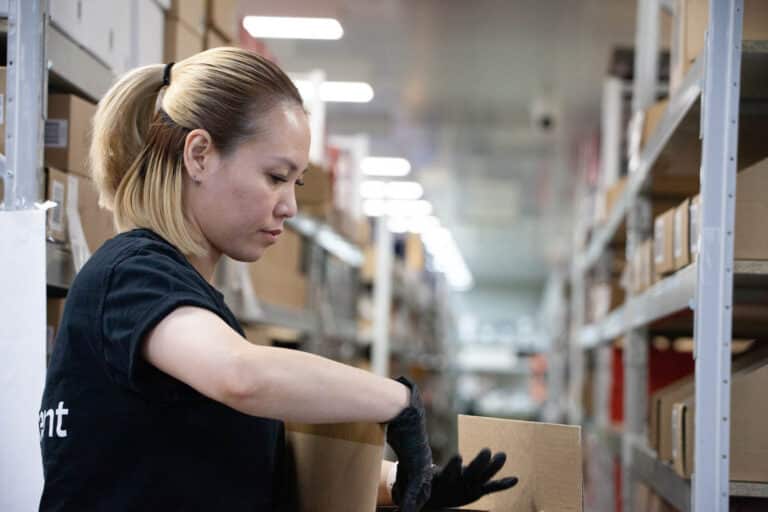 A Fulfilment Australia employee working in the warehouse
